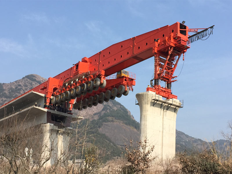 Box girder beam launcher for girder carrying and erecting